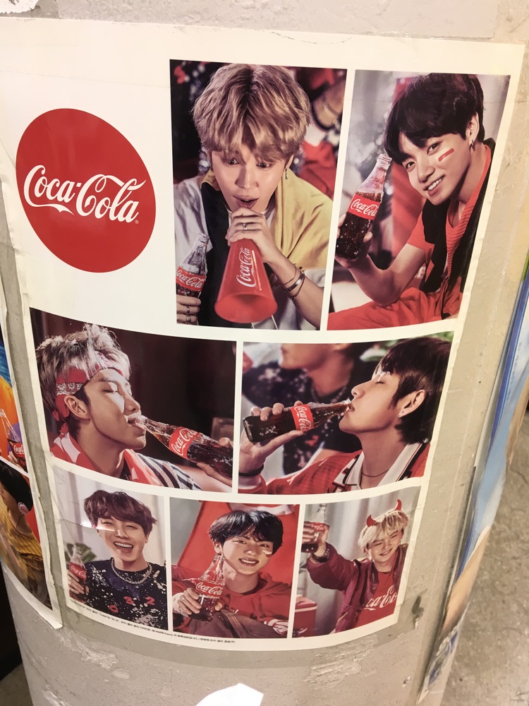 BTS Coca Cola Poster at a convenience store